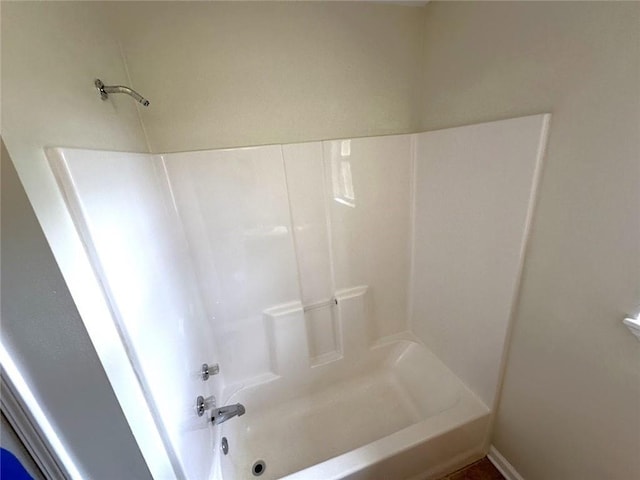 bathroom with shower / bathtub combination