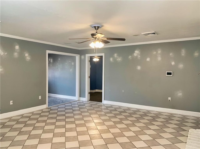 empty room featuring visible vents, crown molding, baseboards, and ceiling fan