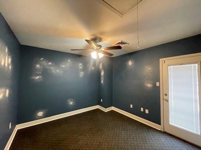 carpeted empty room with ceiling fan