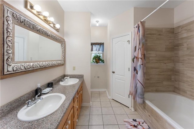 bathroom featuring tile patterned floors, shower / bath combo, and vanity