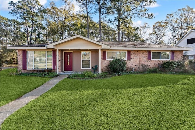 ranch-style home with a front yard