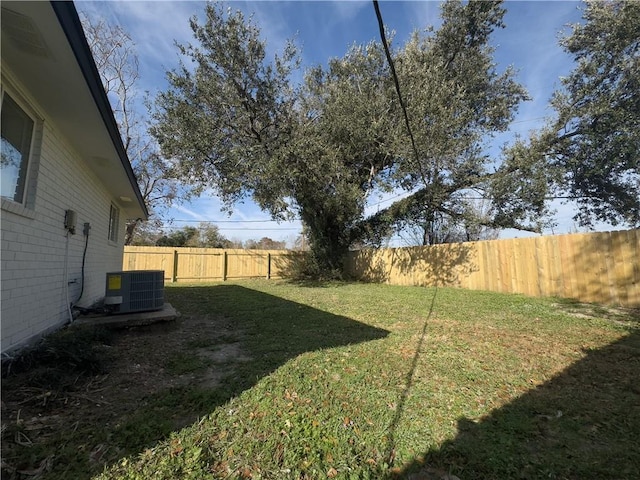 view of yard featuring central AC unit