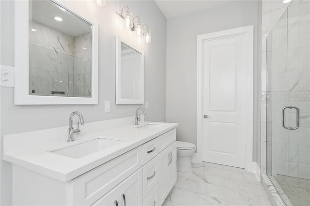 bathroom with vanity, toilet, and walk in shower