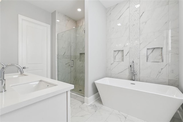 bathroom featuring plus walk in shower and vanity