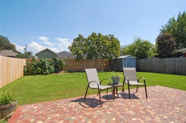 view of patio / terrace featuring a storage shed