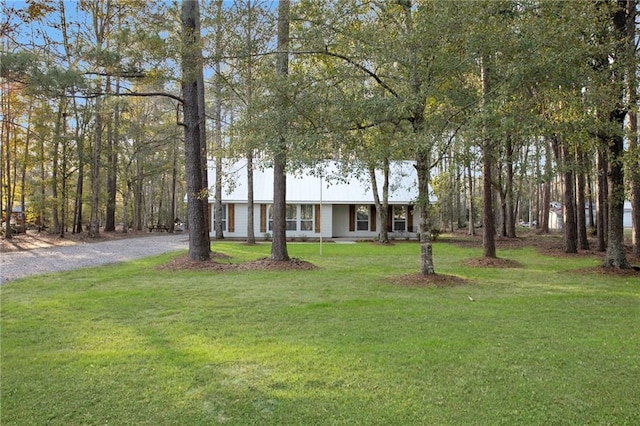 view of front of home with a front lawn