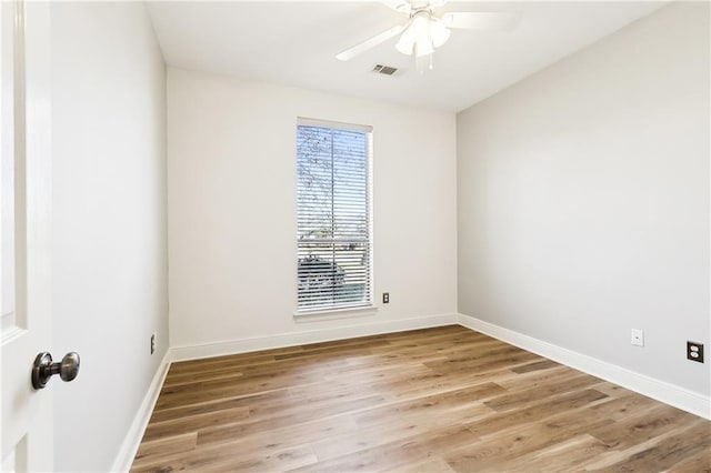 unfurnished room featuring ceiling fan and light wood-type flooring