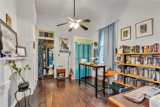 sitting room with ceiling fan and dark hardwood / wood-style floors