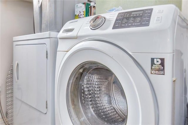 laundry area with washer and clothes dryer