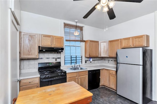 kitchen with ceiling fan, decorative backsplash, sink, and black appliances