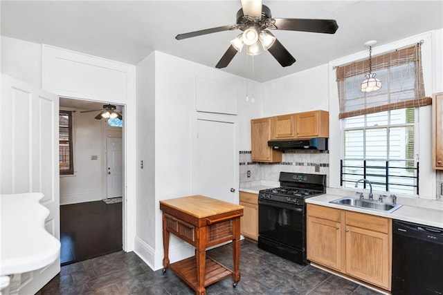 kitchen with black appliances, decorative light fixtures, decorative backsplash, sink, and ceiling fan