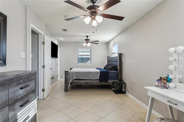 bedroom featuring ceiling fan and light tile patterned flooring