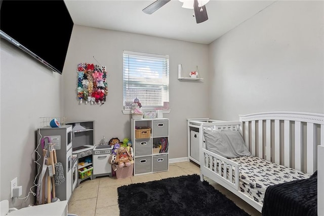 bedroom featuring ceiling fan and light tile patterned floors