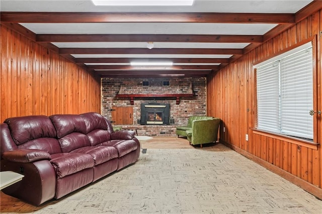 living room with beam ceiling and wooden walls