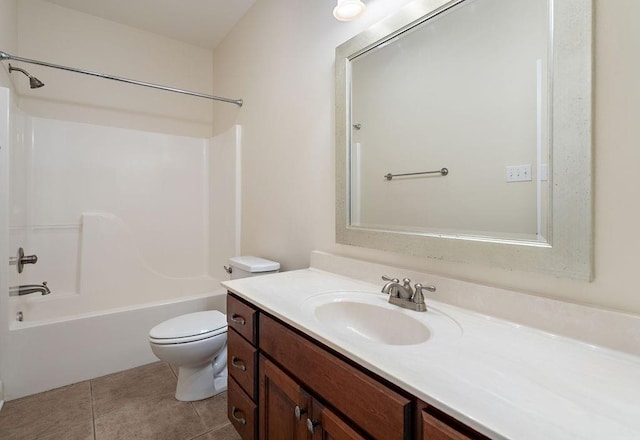 full bathroom featuring toilet, tile patterned floors, shower / washtub combination, and vanity