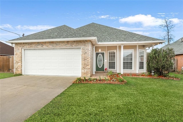 view of front facade with a garage and a front lawn