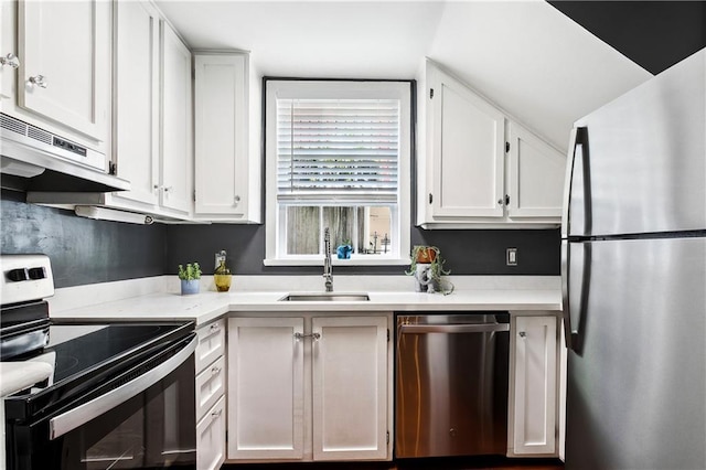 kitchen with sink, extractor fan, white cabinetry, and stainless steel appliances