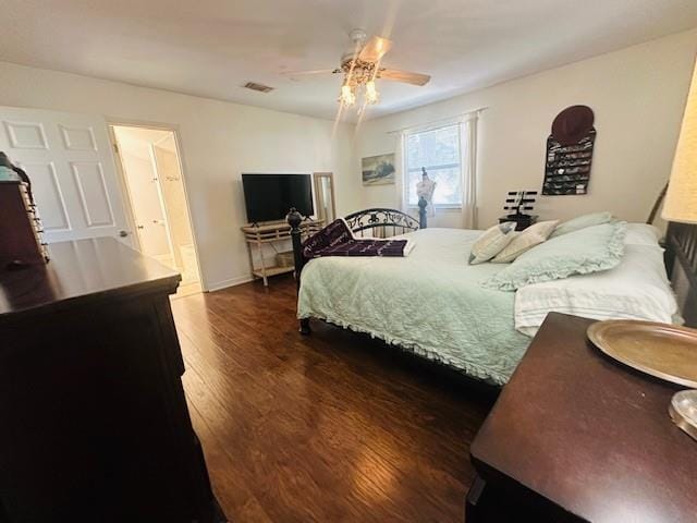 bedroom with ceiling fan and dark wood-type flooring