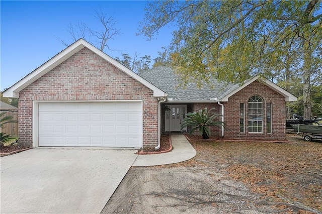 ranch-style house featuring a garage