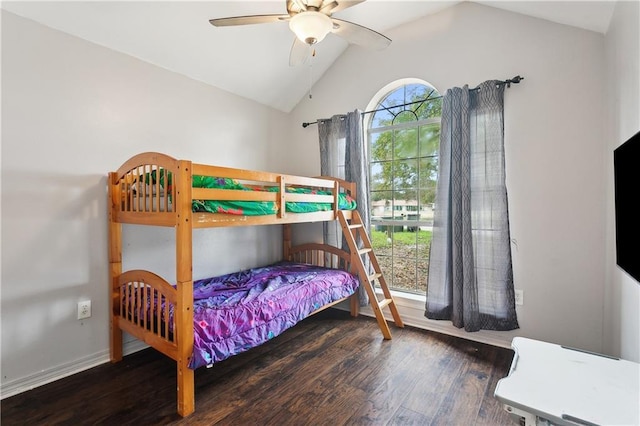 bedroom featuring ceiling fan, vaulted ceiling, and dark hardwood / wood-style flooring