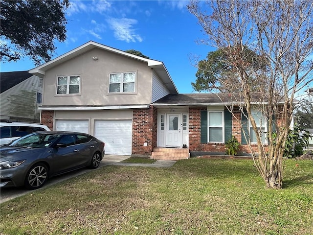 view of front of property with a garage and a front lawn