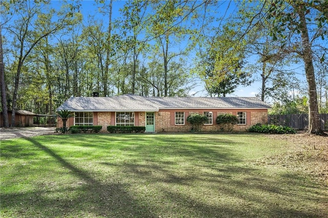 single story home with a front yard