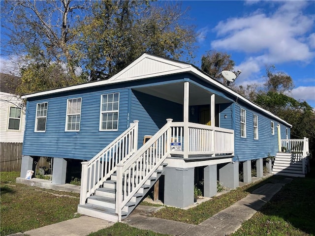 view of front of property featuring covered porch