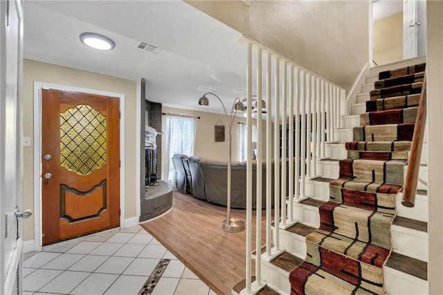 foyer with light tile patterned floors