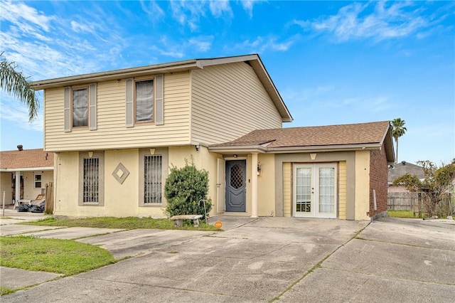 view of property featuring french doors