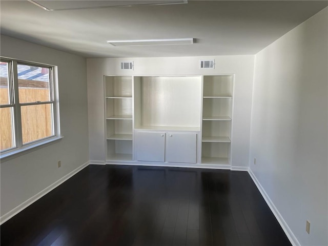 interior space with dark wood-type flooring