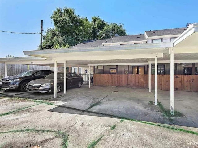 view of parking / parking lot with a carport