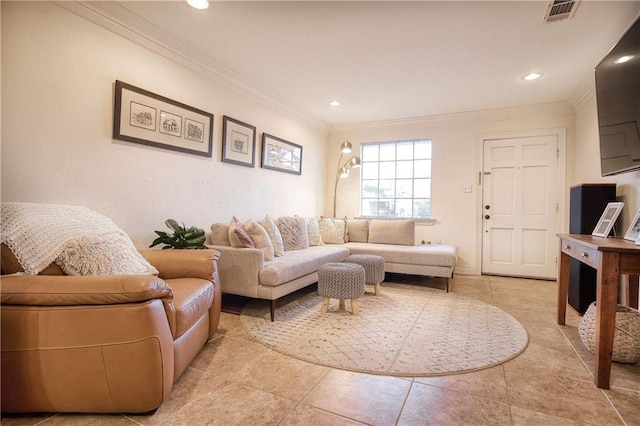 living room featuring crown molding