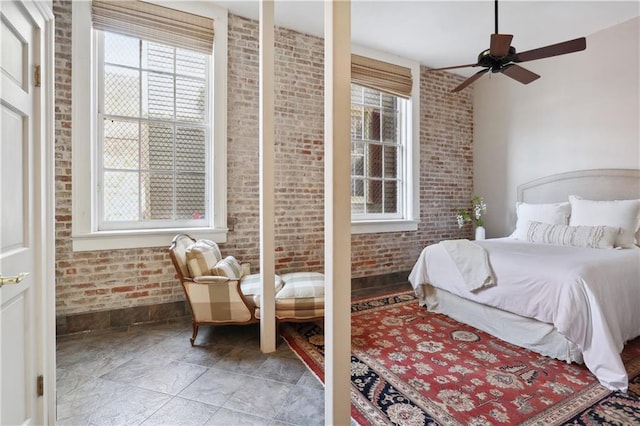 bedroom with brick wall