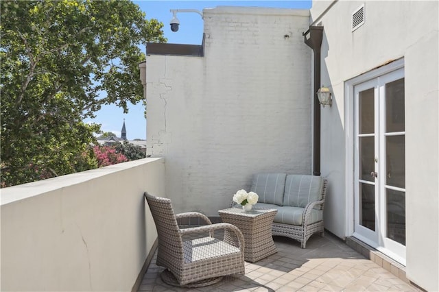 balcony featuring visible vents