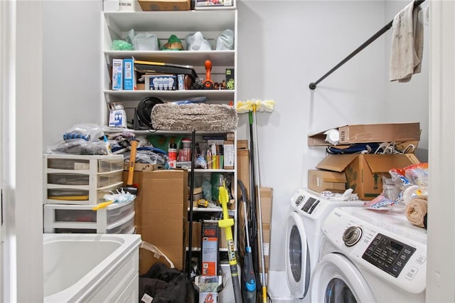 laundry area with separate washer and dryer