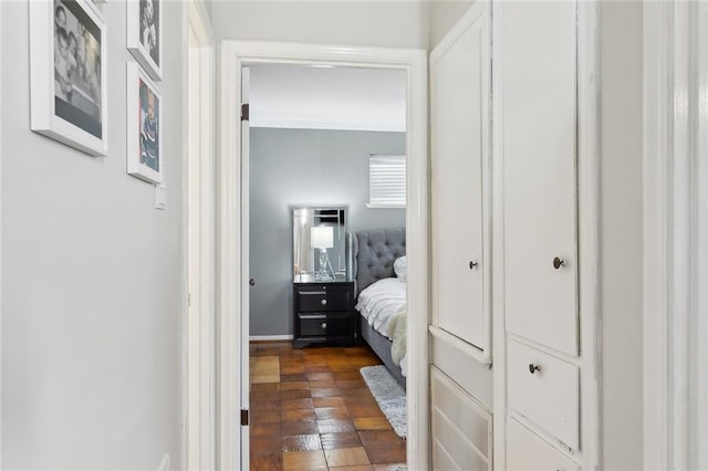 bedroom with dark parquet floors