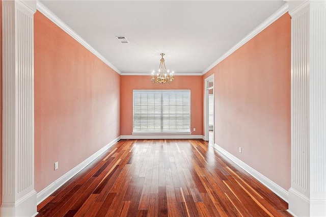 unfurnished dining area with dark hardwood / wood-style flooring, an inviting chandelier, and ornamental molding