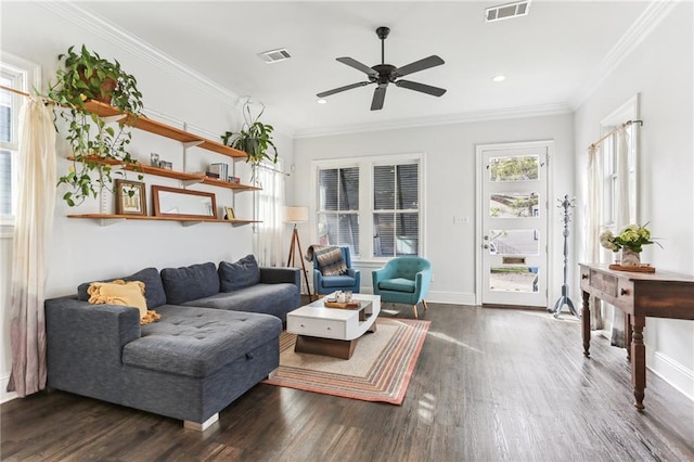 living room with ceiling fan, crown molding, and dark hardwood / wood-style floors