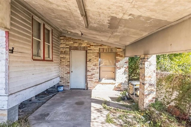 doorway to property with a patio