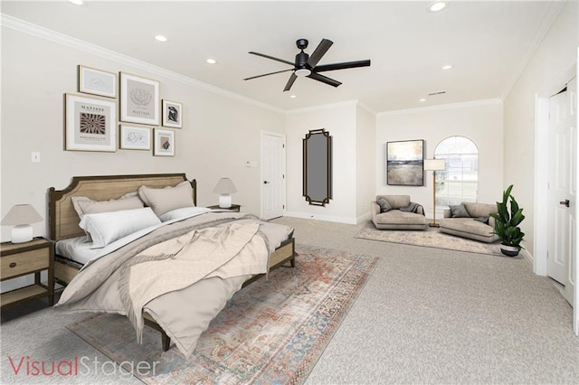 bedroom featuring ceiling fan, ornamental molding, and carpet floors