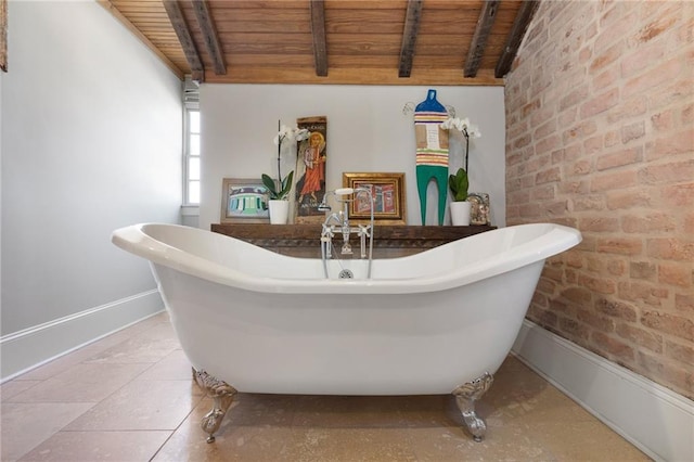 interior space featuring wood ceiling, beam ceiling, and a bathtub