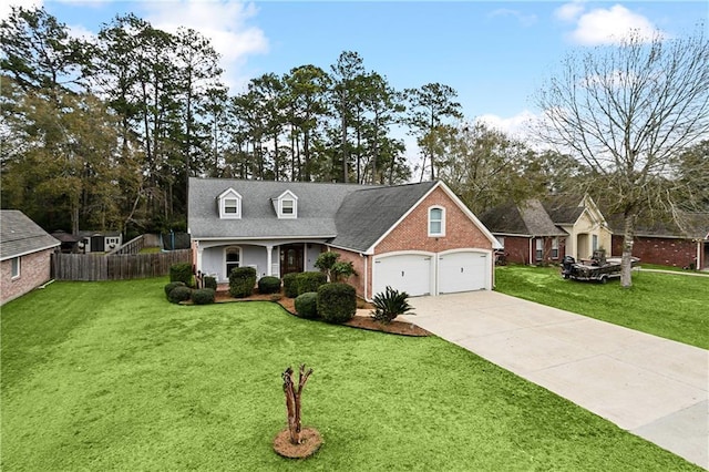 cape cod-style house with a garage and a front yard