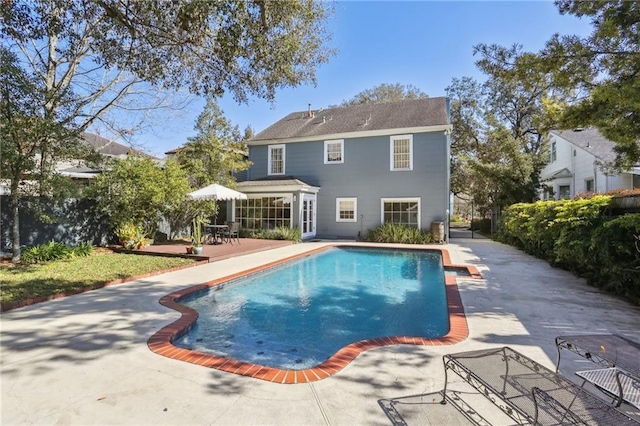 rear view of house with a patio