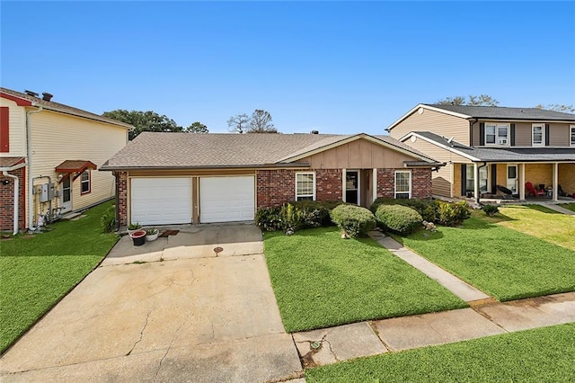 view of front of property with a garage and a front lawn