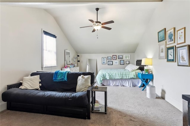 bedroom with vaulted ceiling, ceiling fan, and carpet floors