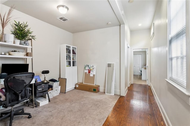 office area with hardwood / wood-style flooring