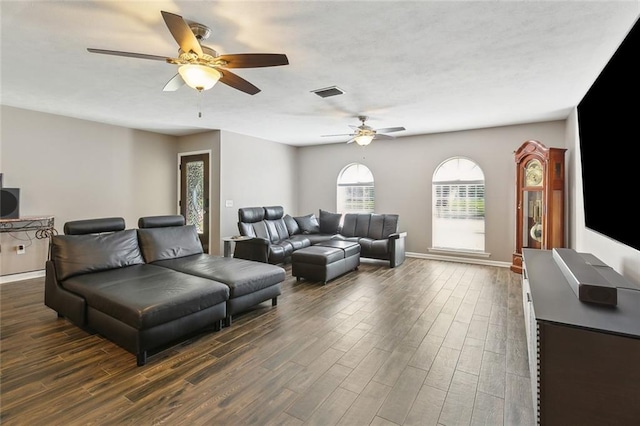 living room featuring ceiling fan