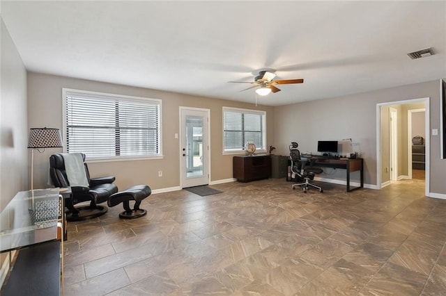 office area with ceiling fan