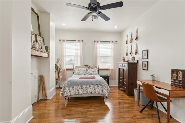 bedroom featuring ceiling fan and light wood-type flooring