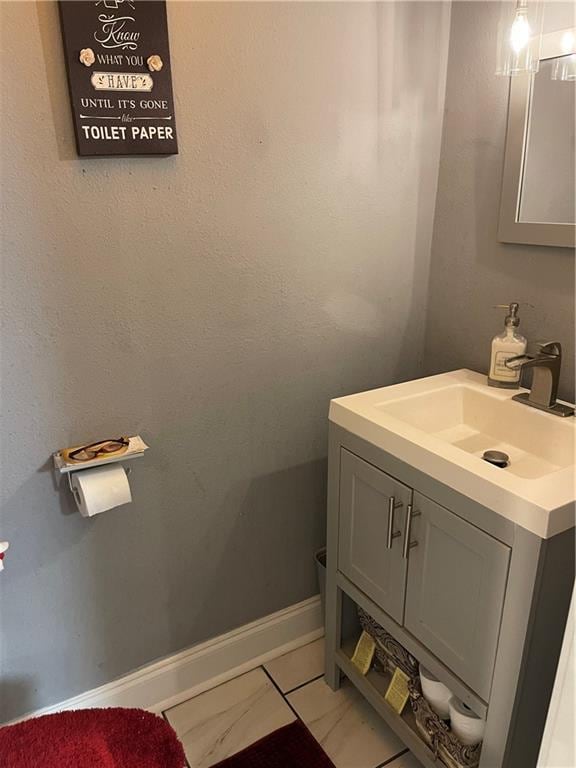 bathroom featuring tile patterned floors and vanity